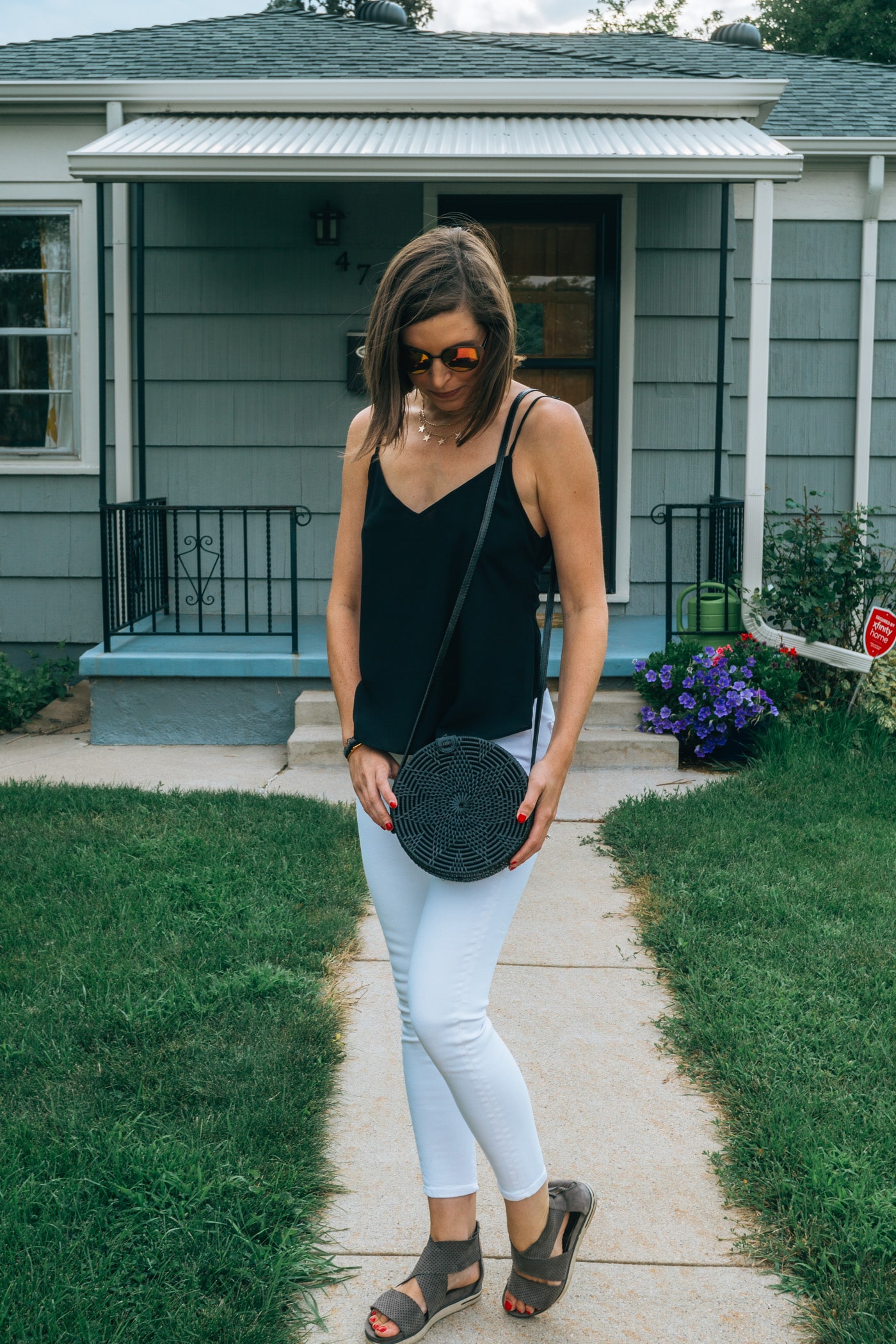 Amerii Rattan Black Bag, white jeans black tank top | Blue Mountain Belle